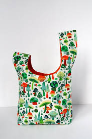 This particular bag isn't lined, but it would be an easy matter to use the front and back as pattern pieces and add a cheery print lining to prevent. Knitting Project Bag Crochet Project Bag Japanese Knot Bag Etsy Knitting Project Bag Japanese Knot Bag Knitted Bags