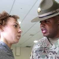 Sgt. 1st Class Kerry Goering slits Sgt. Jared Brooks'