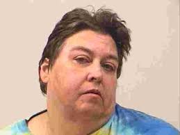 Huntsville woman charged with firing into neighbors' mobile homes and  attempted murder won't go