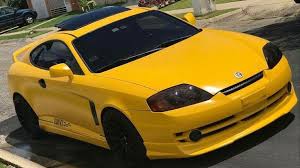 Image result for Pastel Yellow 2000 Tiburon