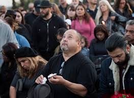 Slain California police officer remembered as hero at vigil, support urged  for police department