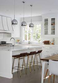 Everyone has stainless steel appliances; 40 Best White Kitchen Ideas Photos Of Modern White Kitchen Designs