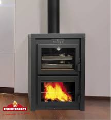 Poele A Bois Contemporain En Fonte Avec Four Sierra Inox Bronpi Calefaccion S L Woonkamer