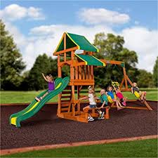 When you've made the exciting decision to install a wooden playset in your backyard, you are then faced with the choices of material, size, and equipment. Amazon Com Backyard Discovery Tucson Cedar Wooden Swing Set Toys Games