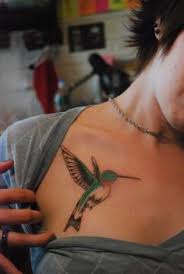 We noticed that the tattoo owners of these cute avian beauties are not just women, as we expect them to be. Female With Hummingbird Tattoo On Chest Tattoo Ideas Center