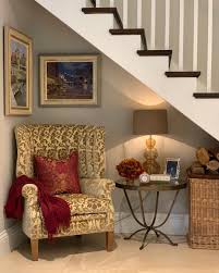 It saves a lot of space. I Decided To Make Good Use Of The Space Under The Stairs In This Family Home Project The Wing Chair From Davids Stair Decor Staircase Decor Under Stairs Nook