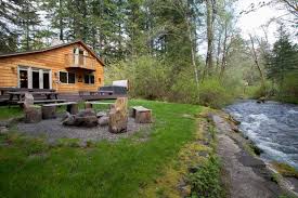 Two bedroom, two bath kitchen, living & dining areas. Lazy Bears Creekside Cabin At Mt Rainier Vacation Rental