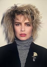 some rare photos of Kim Wilde in her early ' 80s rock phase compete with  Pat Benatar-like hairdo " ! (Kim vs Pat, Wild Life-source )