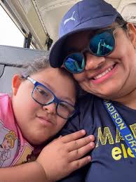 This is my son Benjamin. He has Down Syndrome and is 16 years old. He was  born with 2 wholes in his heart that closed up but now has a leaking valve