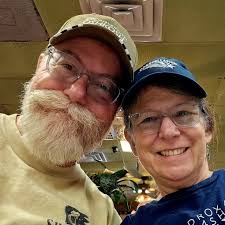 What are some compact folding electric scooter options for use in an  airplane?