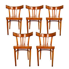 Know about all types of vintage old wooden chairs, crafted out using elegant styles and antique wooden chairs, available in a wide variety of styles, shapes and sizes can depict a statement of royalty and luxury in any home. Vintage Wooden Dining Chairs From Kok Set Of 5 For Sale At Pamono