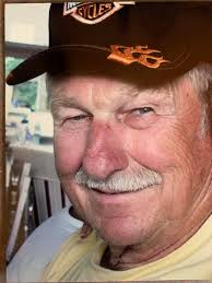 OBITUARY OF MARK J....