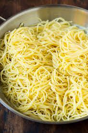 Brown scallops in a skillet while the pasta is cooking, then prepare a fragrant garlic, olive oil, and wine sauce to pair with the angel hair, tomato, corn, and scallops. Angel Hair Pasta With Garlic And Herbs Dinner At The Zoo