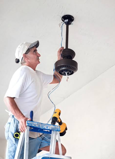 Fitter balancing a ceiling fan in Mottingham