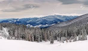 Panorama Of Winter Mountains Landscape Under Cloudy Sky Stock Photo Picture And Royalty Free Image Image 110540795