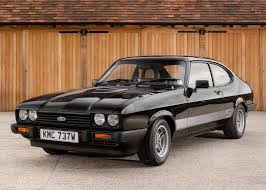 Image result for Gold 1980 Capri