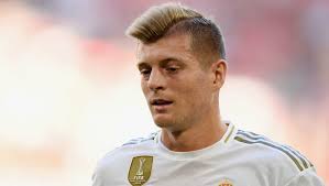 Toni kroos's height is around 6 feet tall and his body weight is 78 kilograms. Toni Kroos Hairstyles