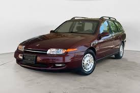 Image result for Bright Red 2000 Saturn