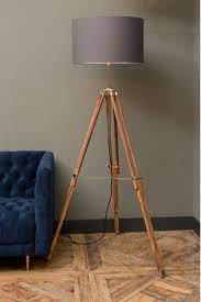 Tripod floor lamp mid century standing lamp floor studying light, flaxen lampshade with e26 lamp base for living room, bedroom, study room, and a statement piece that fits into every contemporary space, this kenner 63 tripod floor lamp attracts attention with its simple lines and curves. Buy Libra Wooden Tripod Floor Lamp From Next Ireland