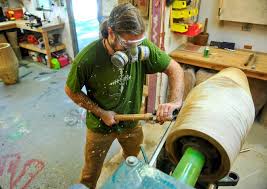 From tree trunks, congas emerge