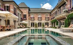 This Brick Stone Mansion Is Located At 2756 Turtle Bluff Drive In The Gated Turtle Lake Community In Blo Bloomfield Hills Luxury Homes Exterior Stone Mansion