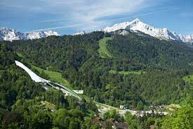 It was the site of the 1936 winter olympics , the first to feature alpine skiing. Garmisch Partenkirchen Hotel Konigshof Garmisch