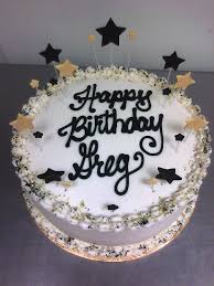 Any grad would flip over this gold, black and white themed cake. Black And Gold Cake Main Made Custom Cakes