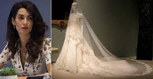 It was reported that they were to attend the royal wedding as markle and amal clooney have known each other for some time. Amal Clooney Has Lent Her Wedding Dress To This Incredible Fashion Exhibition
