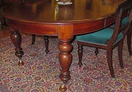 Flaunting sharp edges, geometric shapes and layered materials; Antique Australian Cedar Extension Dining Table The Merchant Of Welby