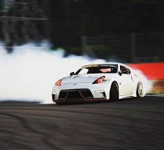 370z Drift Nissan 370z Nissan370z Drift Racing Garret Na Toyo Toyotires Smoke Nismo Red White Drifting Cars Drift Cars Nissan