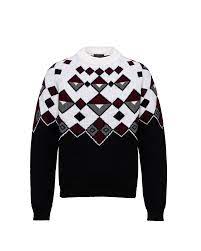 Check out our sweater selection for the very best in unique or custom, handmade pieces from our clothing shops. White Argyle Wool Sweater Prada