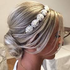 For those who like the messy bun look but want to take it up a notch can add a stone encrusted tiara/headband that will give you that regal look. 35 Easy And Fancy Ideas Of Wearing Hair Bun For Short Hair