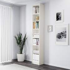This bookcase features a solid wooden construction with a white finish. Billy Bookcase White Ikea