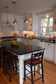 Every one says that the kitchen is the heart of the home… and believe us, we truly believe that! Modern Kitchen Island With Attached Table Novocom Top