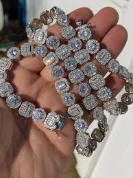 This handcrafted tennis bracelet is iced out and ready to make you shine all day & night long ! Baguette Iced Out Tennis Chain 10 5mm Solid 925 Sterling Silver