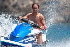 Rafael nadal reflects on his win over laslo djere. Rafael Nadal Goes Shirtless As He Takes To The Waves On A Jetski In Ibiza Daily Mail Online