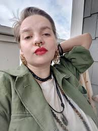 Female student with Supernatural Dean Winchester backpack