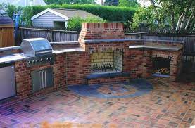 For safety and durability, it is essential that construction be carried out properly. Outdoor Kitchen In Brick Brick Patio Outdoor Kitchen Kurt Schall And Sons Patio Backyard Fireplace Country Patio
