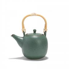 Maybe you would like to learn more about one of these? Gurin Green Procelain Teapot With Filter And Bamboo Handle