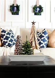 Navy and white is a very contrasting color scheme, and if you think that it's too cold, add natural wood touches, wicker, tan or brass accents for more elegance. Christmas Decorating Ideas Neutral Burlap White Navy Rustic Living Room It All Started With Paint 8 Of 36 It All Started With Paint