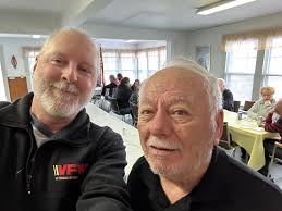 Getting ready for the memorial service at the Veterans of Foreign Wars  Department of Connecticut annual convention.