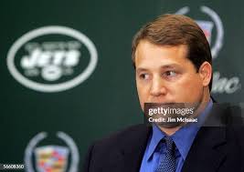 Eric Mangini sits with his wife Julie and mother Nancy during the... News  Photo