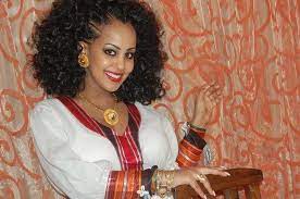 Beautiful Ethiopian Woman With A Traditional Dress Hairstyle And Jewelry Divine Ethiopian Hair Beautiful Ethiopian Women Ethiopian Beauty