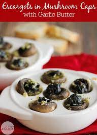 Escargots In Mushroom Caps With Garlic Butter Recipe Stuffed Mushrooms Stuffed Mushroom Caps Escargot Recipe