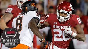 Smoke filters through the crowd after as the osu team takes the field before a college. Oklahoma Edges Oklahoma State In Bedlam College Football Highlights Youtube