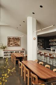 The menu boils down to seasonal california cuisine with global influences. Kelly Wearstler Hotel Design Santa Monica Proper Communal Table Restaurant Bar Design Restaurant Dining Table Design