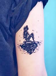 Color tattoo of an ocean pearl with ariel from the little mermaid and crush the baby turtle in finding nemo. 55 Disney Princess Tattoos That Honor Beauty And Strength