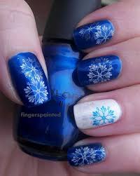 10) a winter mosaic of colors with a striking stained glass nail art design. Easy Winter Nail Art Designs Listinspired Com