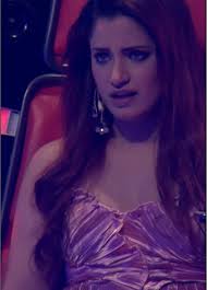 Isaac Timothy and Raini Singing Couch