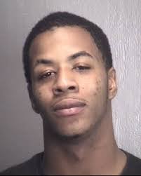 Two women charged in armed robbery